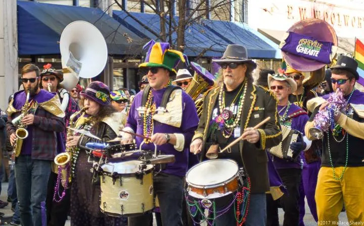 The Asheville Second Line band marching in costume